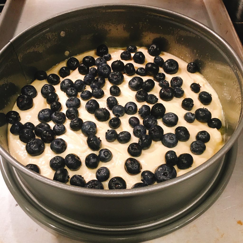 Pouring batter first step Blueberry Crumb Cake